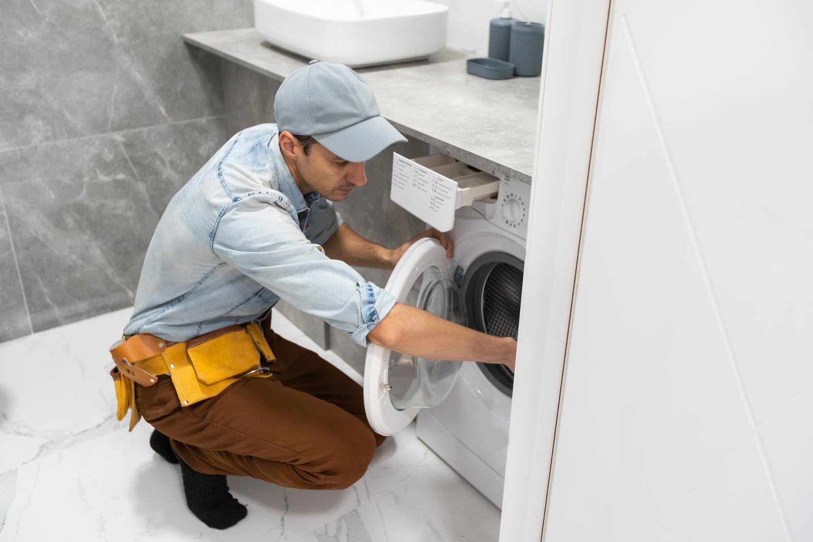 45101828 Plumber Repairman Repairing Washing Machine Min
